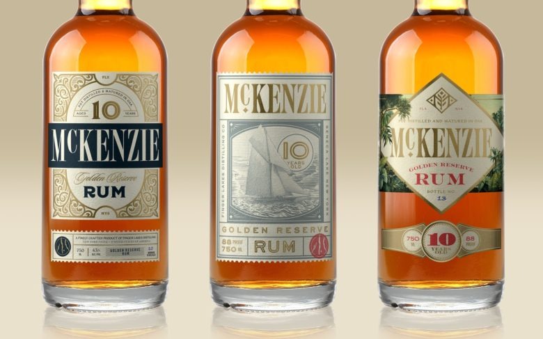 Три бутылки с разными этикетками McKenzie 10-Year Barrel Reserve Rum