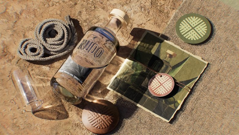 Композиция с бутылкой мескаля, веревкой и аксессуарами на песке Nudo Salvaje Mezcal