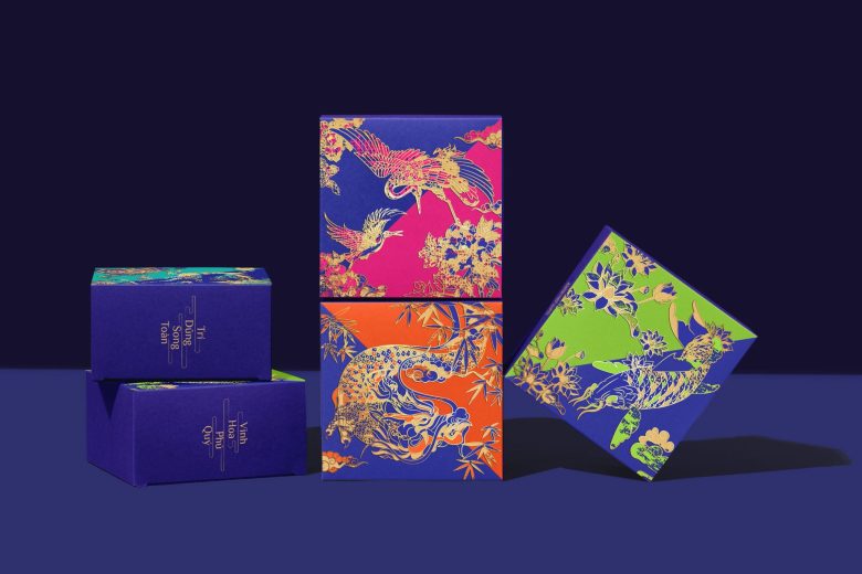 Коробки лунных пряников с яркими иллюстрациями птиц Tu Binh Mooncakes