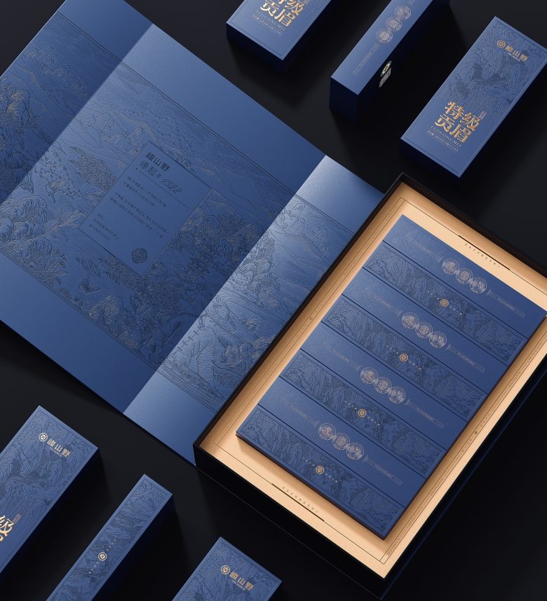 Открытая синяя коробка чая с внутренним оформлением Junshanye x Gugo Brand