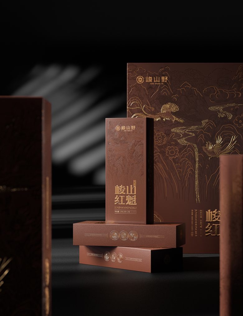 Премиальная упаковка чая с набором коробок на темном фоне Junshanye x Gugo Brand