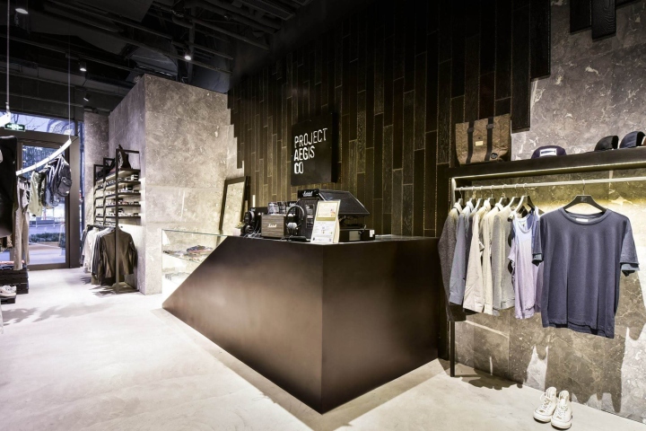 Отделка стен декоративным камнем в дизайн проекте магазина одежды