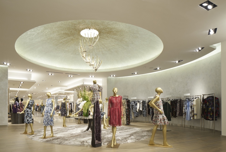 Дизайнерский магазин - круглая светлая комната с одеждой