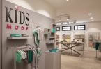 Интерьер магазина детской одежды Kids Mode: сбалансированное пространство с узнаваемым стилем