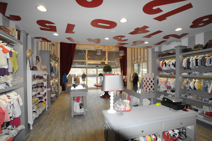 Прекрасный магазин детской одежды Lucignolo от Studio Zerozero в Италии