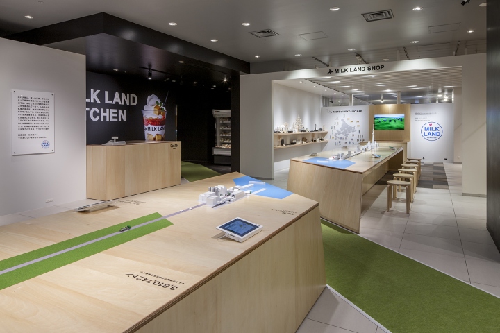 Оформление магазина молочных продуктов в Токио, Япония: огромный стол разделён на 2 части